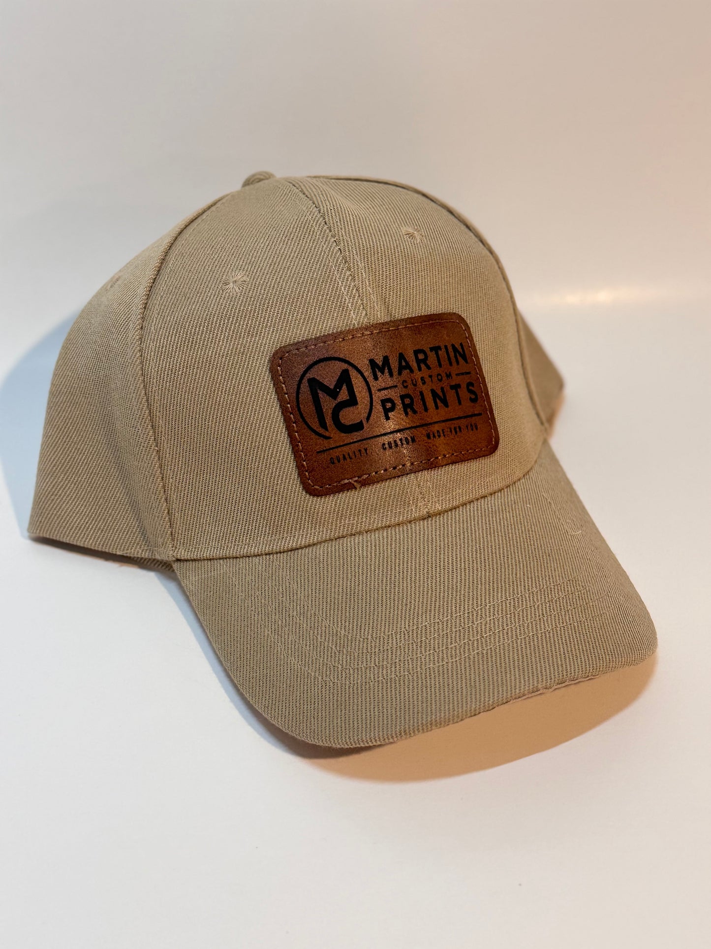 Baseball cap with custom leather patch