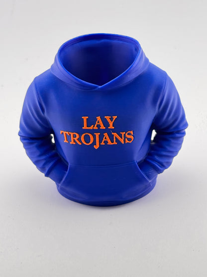 A royal blue novelty hoodie-shaped object with 'LAY TROJANS' printed in orange across the chest, photographed on a light gray background.